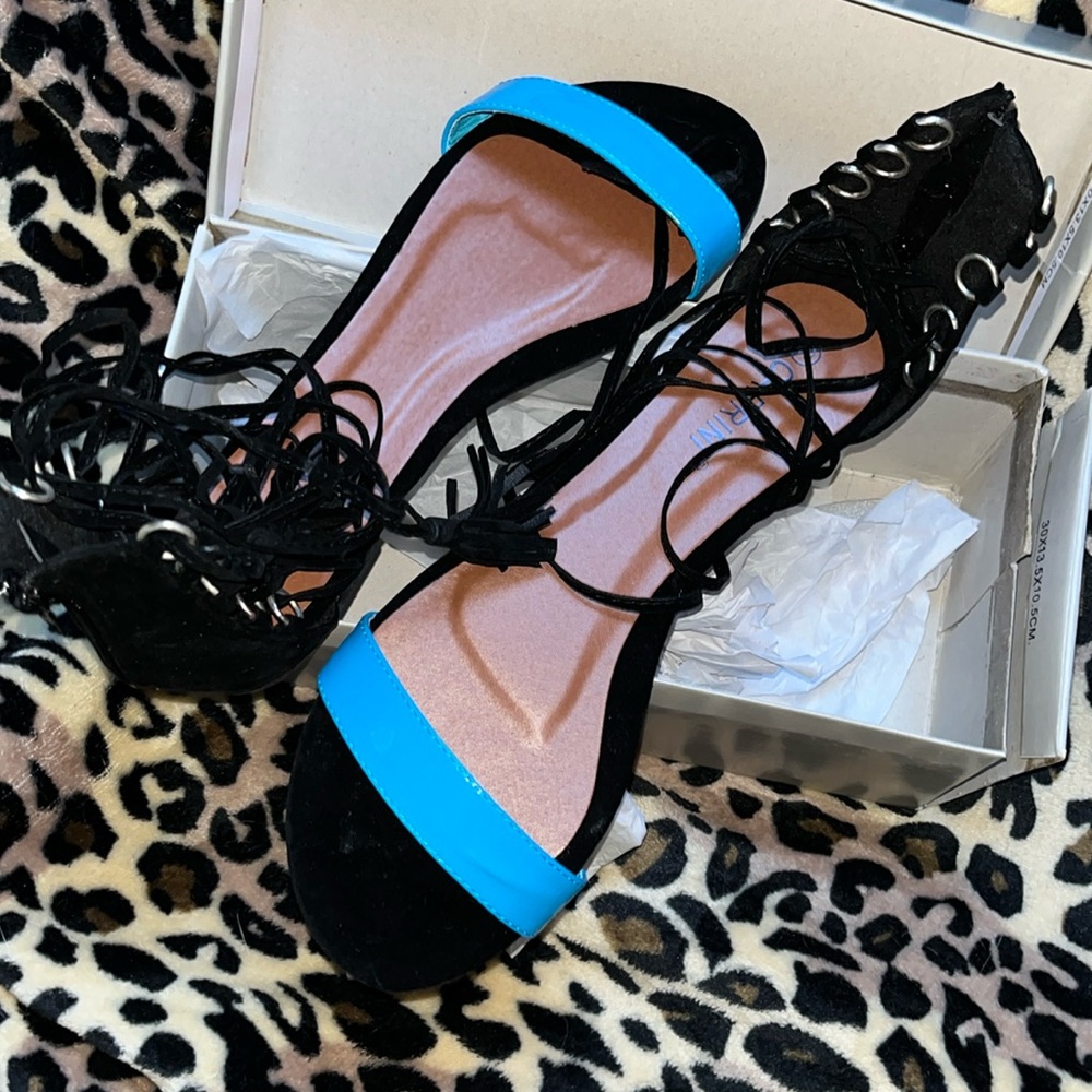 Carrini woman's black suede with blue strap